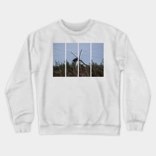 Wonderful landscapes in the Netherlands. Historic dutch windmills in Kinderdijk in a cloudy autumn day. Unesco site. Natural view from distance. Crewneck Sweatshirt